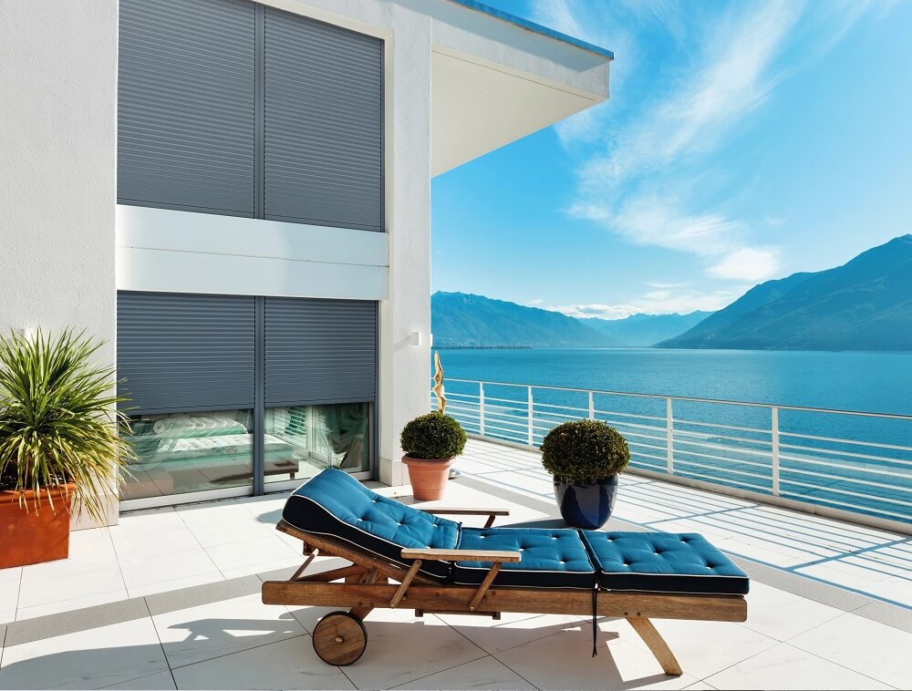 Modern roller shutters on beautiful oceanfront property